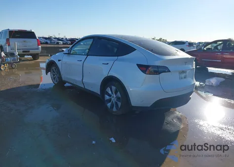 2023 Tesla Model Y Rwd from USA, damaged, VIN 7SAYGDED9PF942211